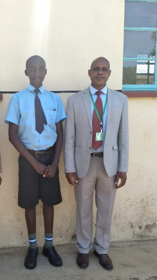 Head teacher of Eronge Adventist Boarding School in Nyamira County with Griffins Amwoma who scored 427 marks in KCPE 2020 Exam Head teacher of Eronge Adventist Boarding School in Nyamira County with Griffins Amwoma who scored 427 marks in KCPE 2020 Exam